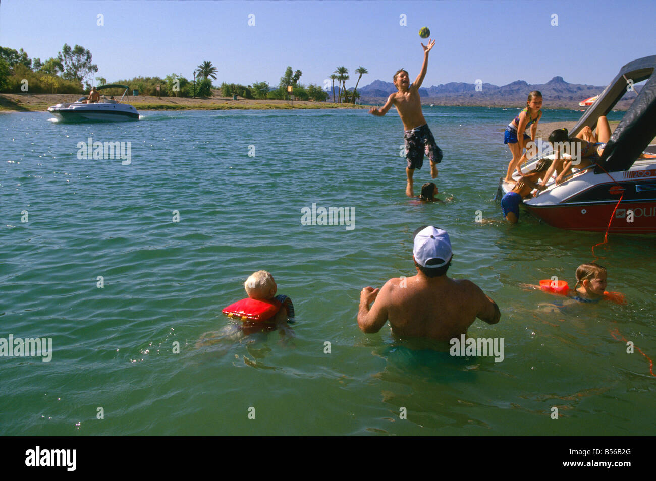 Families play in the waters of Lake Havasu, Parker Dam on the Colorado River,at Lake Havasu City