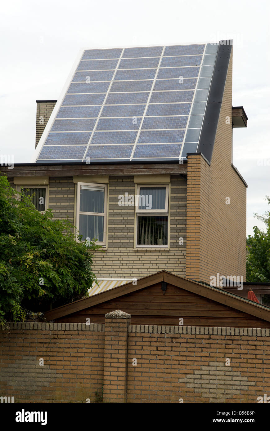 Shell solar panels fitted to houses on the world's largest solar powered housing estate, Nieuwland, Amersfoort, Netherlands. Stock Photo