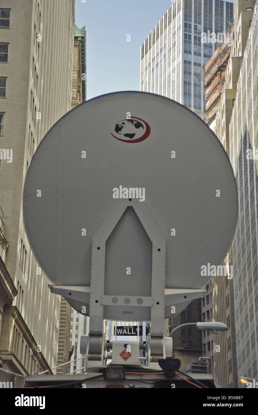 TV company's satellite dish transmitter outside New York Stock Exchange during the credit crunch financial crisis of 2008 Stock Photo