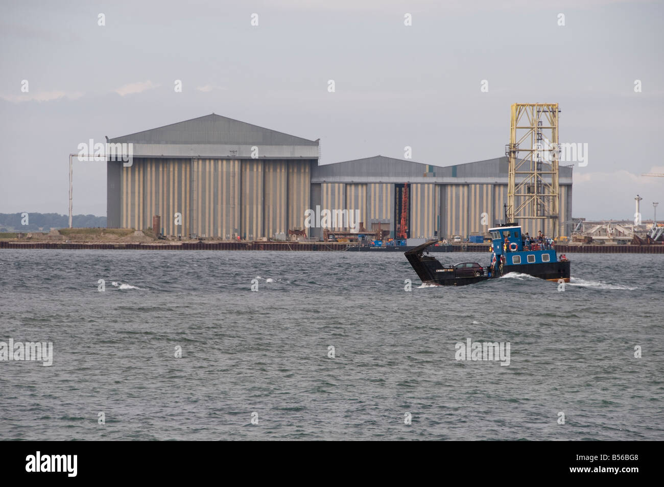 Nigg Yard on Cromarty Firth with Nigg Ferry in foreground Stock Photo