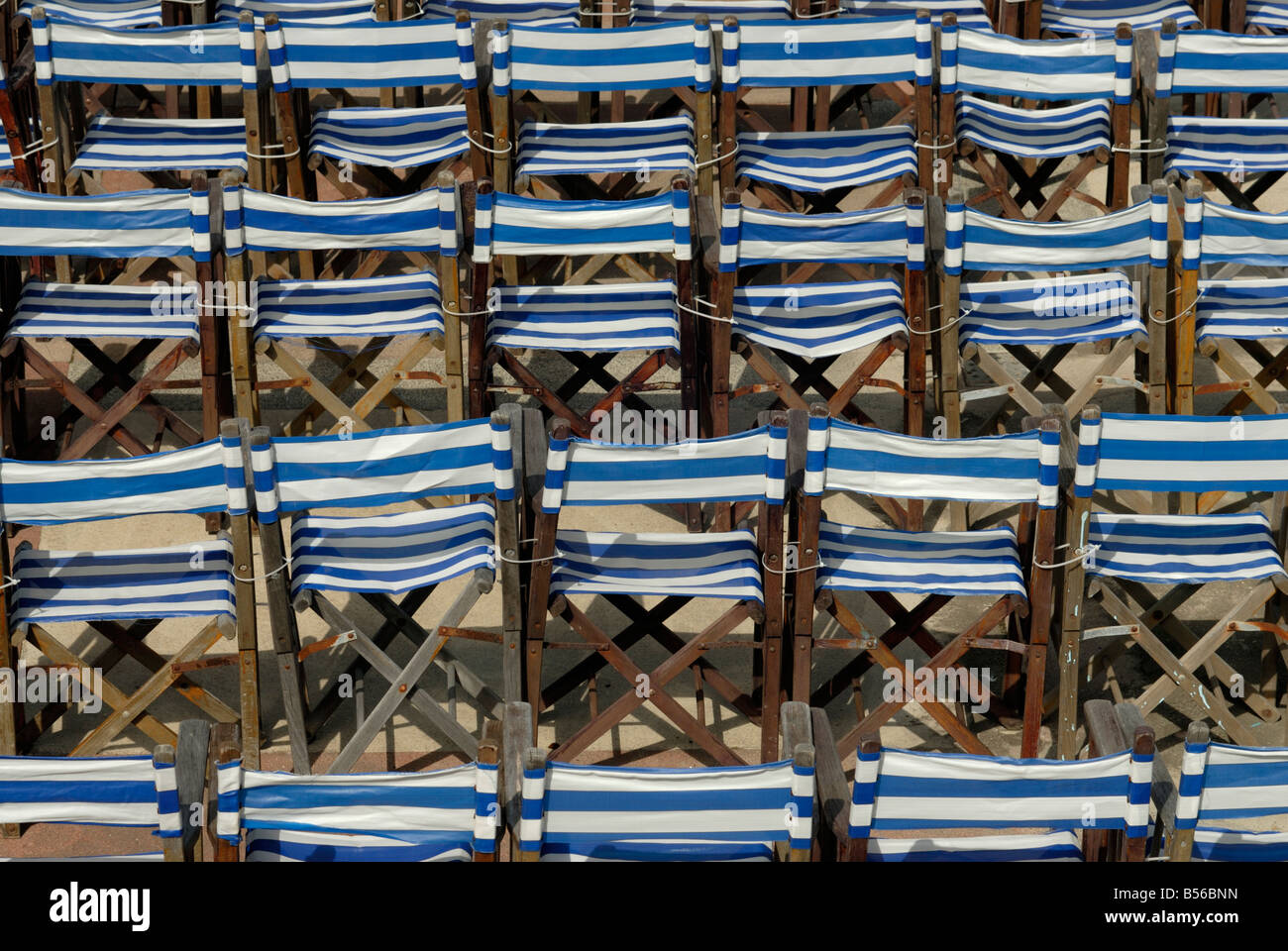 Blue and white striped deck chairs hi-res stock photography and images ...