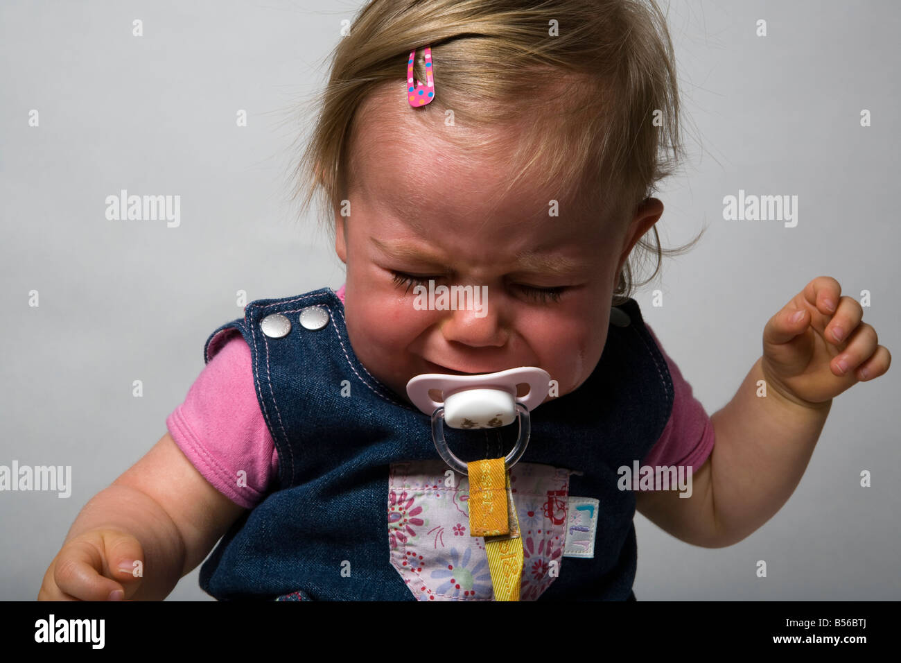 Baby Girl Crying Stock Photo - Alamy