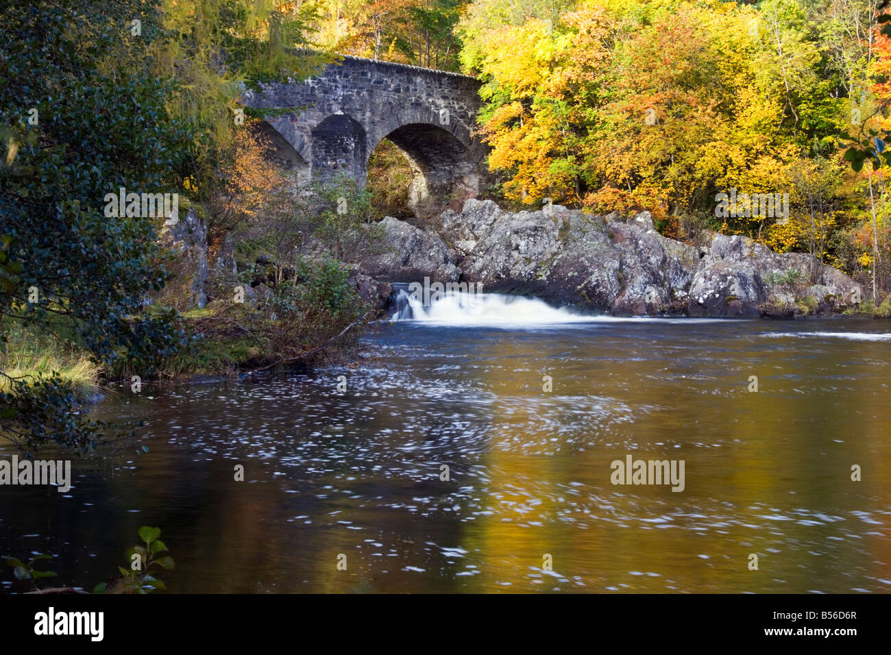 autumn colour at the Bridge of Balgie in Glen Lyon Scotland Stock Photo
