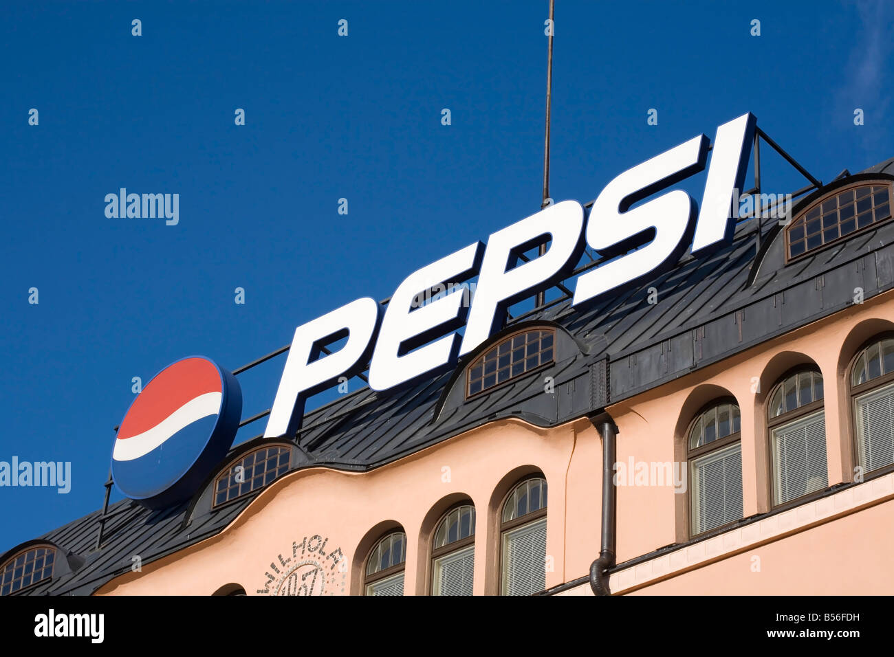 Pepsi sign on building roof Stock Photo