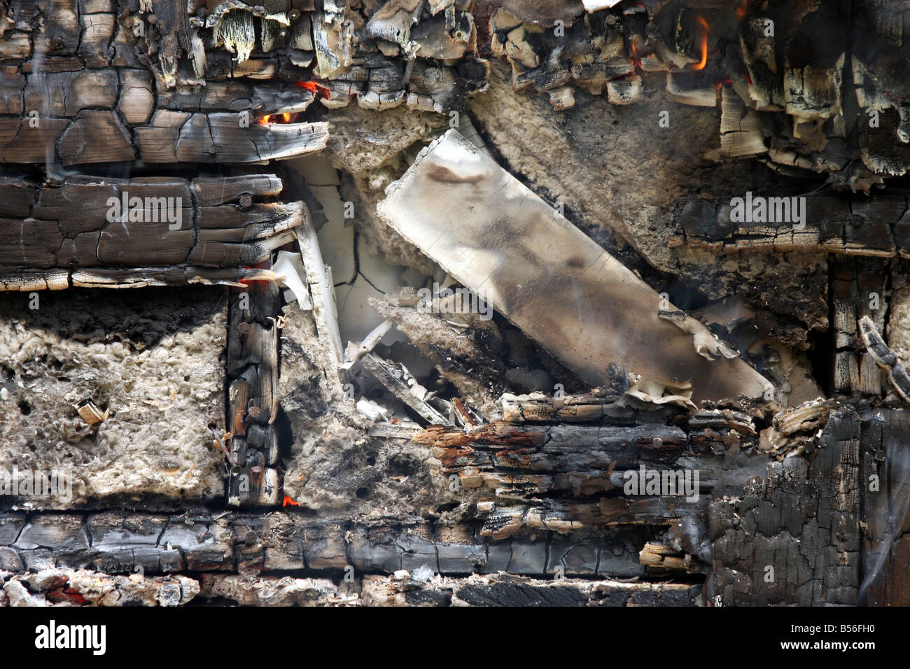 An exterior wall of a house on fire Stock Photo - Alamy