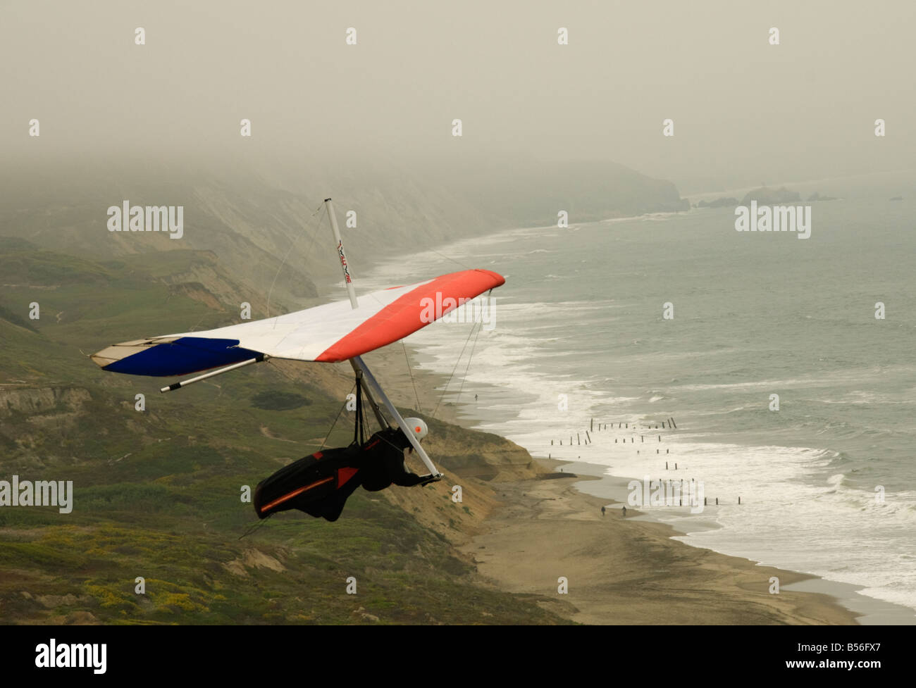 California San Francisco A hang glider launching into the fog at Fort Funston Photo 25 casanf31575 Photo Lee Foster 2008 Stock Photo