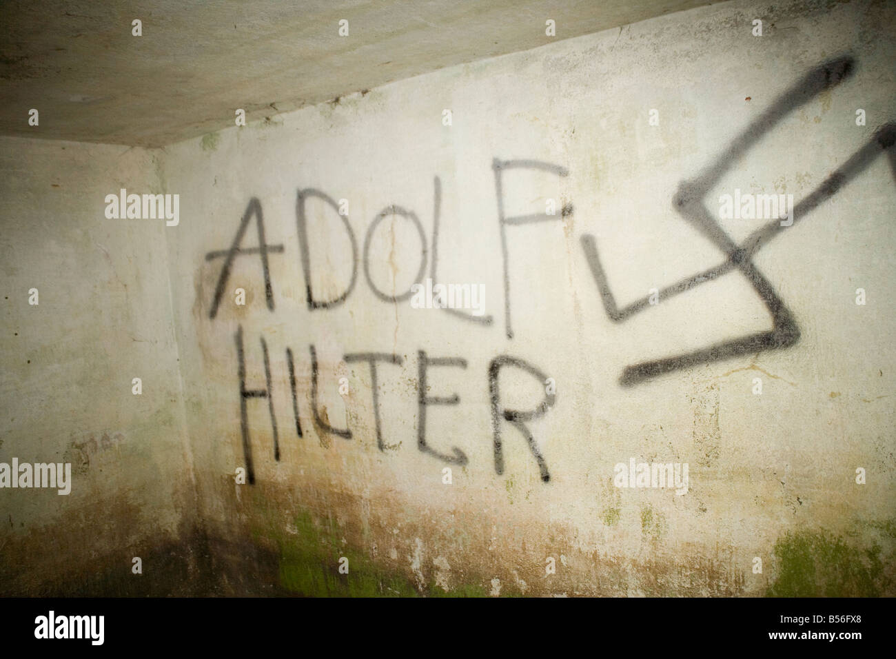 Right wing graffiti in a German First World War command bunker at  Zandvoorde near Ypres,Flanders, Belgium badly misspelt Stock Photo