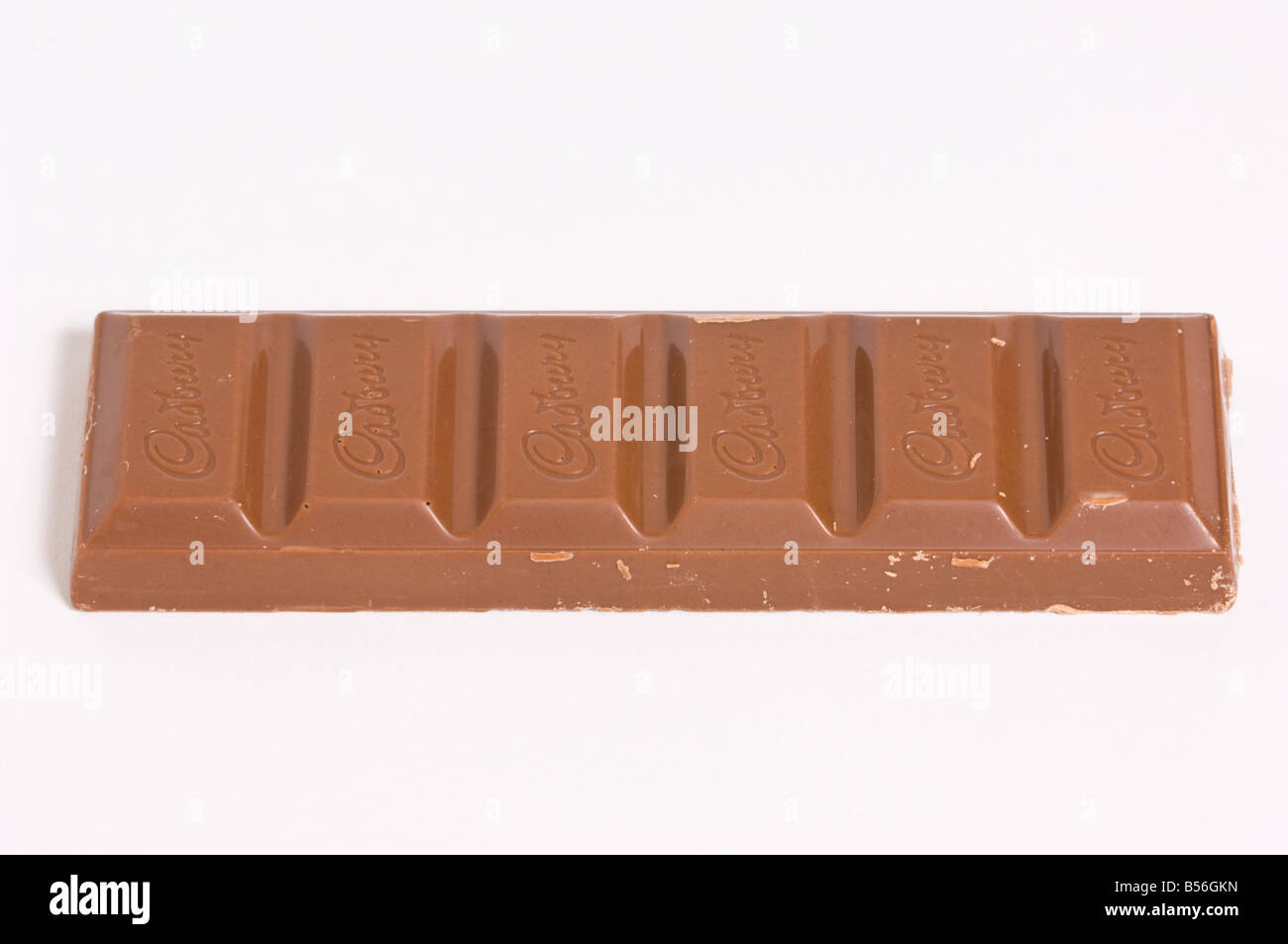 Cadburys Dairy Milk Chocolate bar (unwrapped) on white background Stock Photo