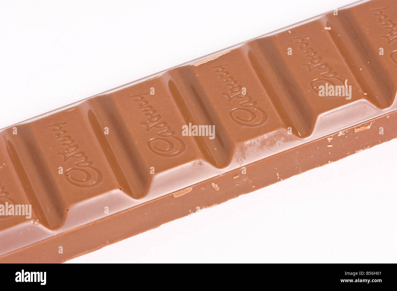 Cadburys Dairy Milk Chocolate bar (unwrapped) on white background Stock