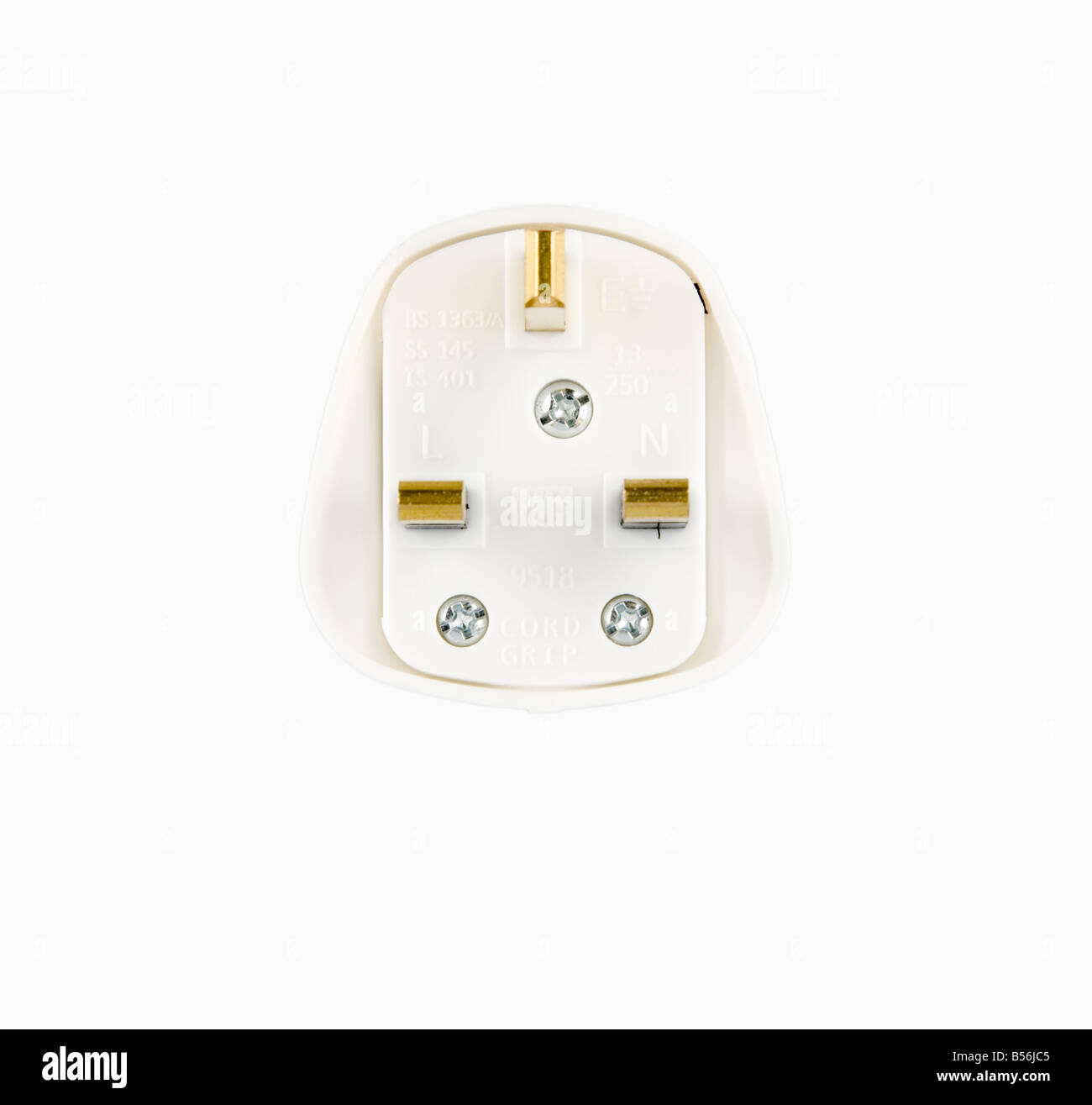 UK three pin plug with pins face up Stock Photo