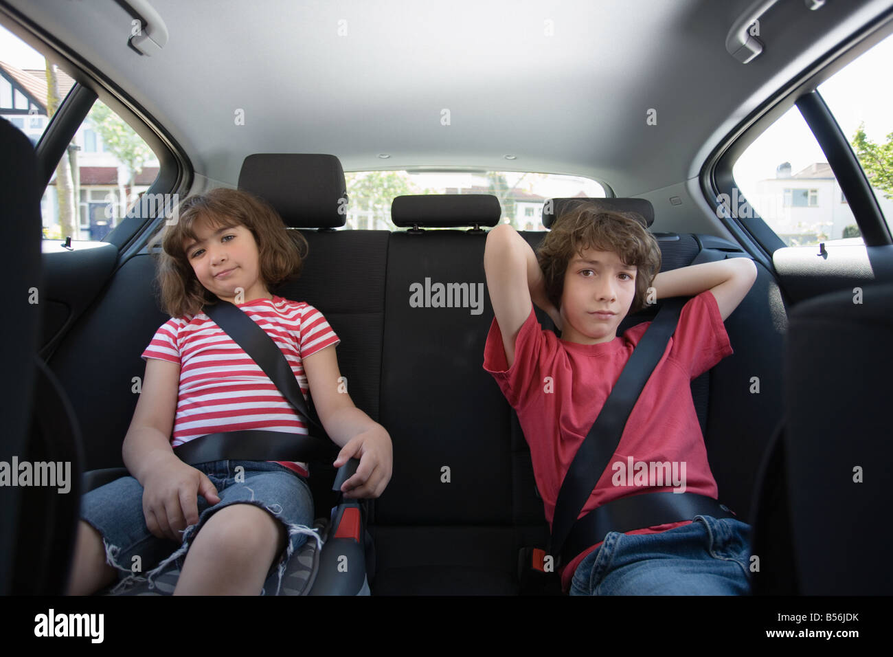 Children sat in a car Stock Photo
