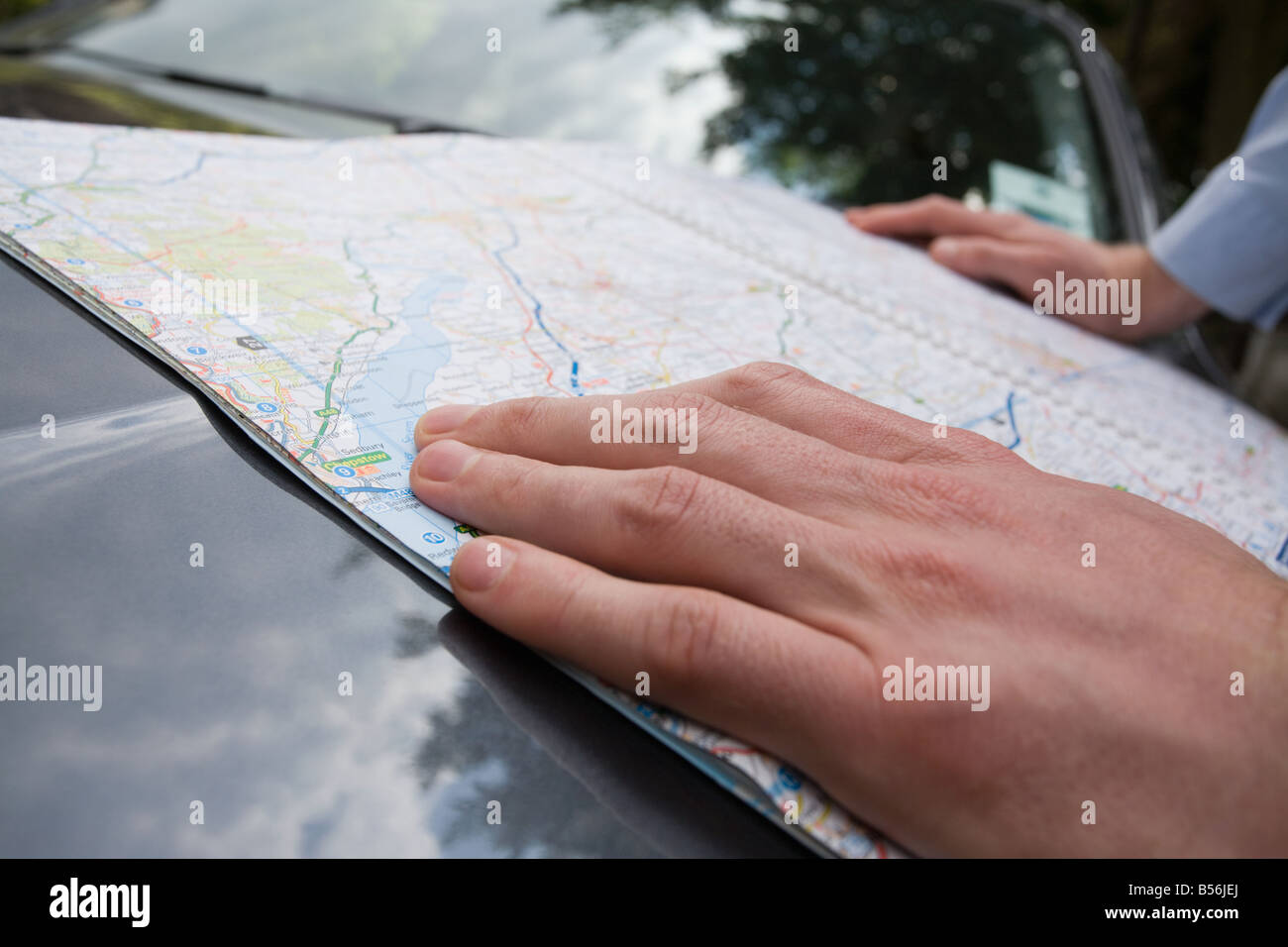 A man with a map Stock Photo