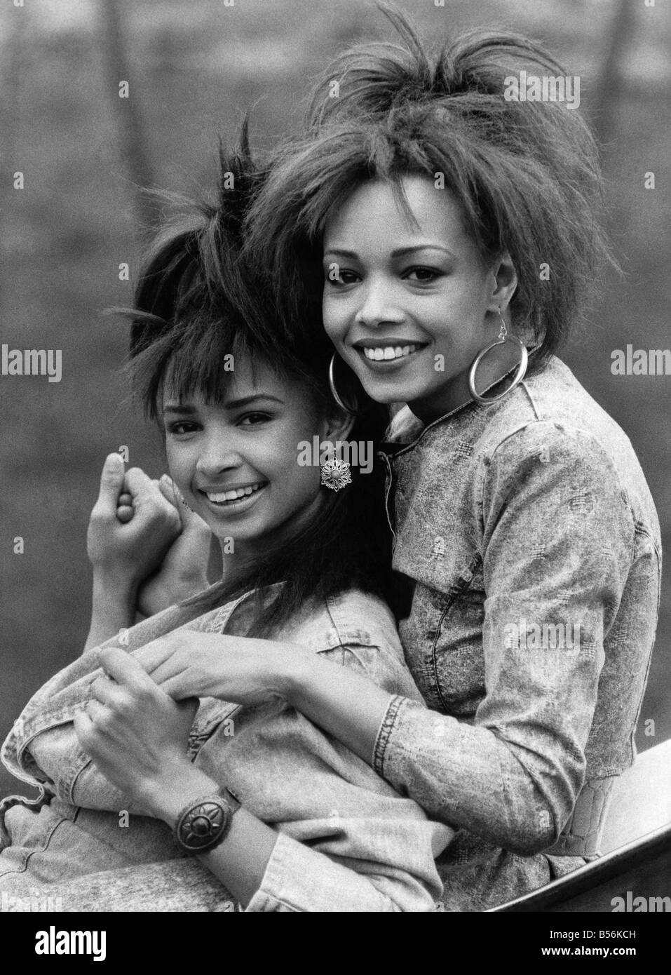 Sisters Mel and Kim have plenty to smile about-they're just knocked Boy
