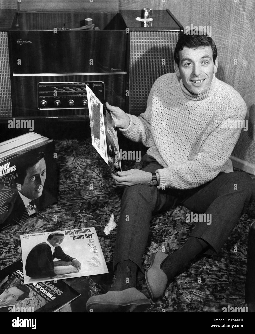 Ian Callaghan, Liverpool F.C.'s right winger relaxes with his record