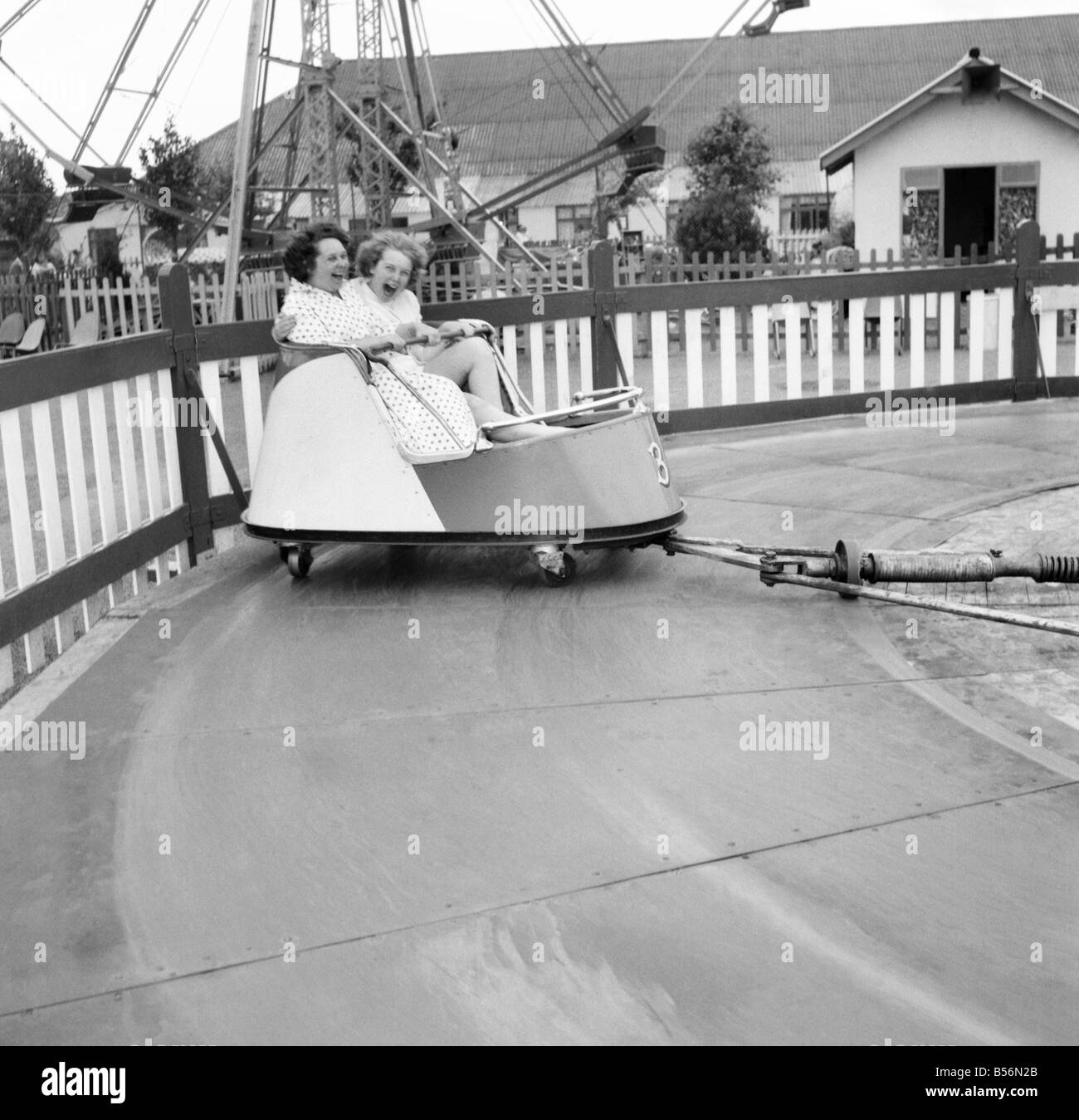 Bultins Holiday Pwllheli: Mrs. Nellie McGrail, Pools Winner. Horse riding/Boating/Elephant/Roller skating/Family. At the Funfare - Mrs. McGrail and Barbara. June 1960 M4480-022 Stock Photo