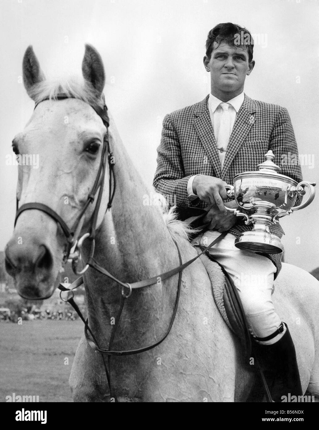 Mr. Harvey Smith, of York, pictured with trophy after winning the Lancashire Area International Trial event in 60 3/5 secs. July 1963 P009723 Stock Photo