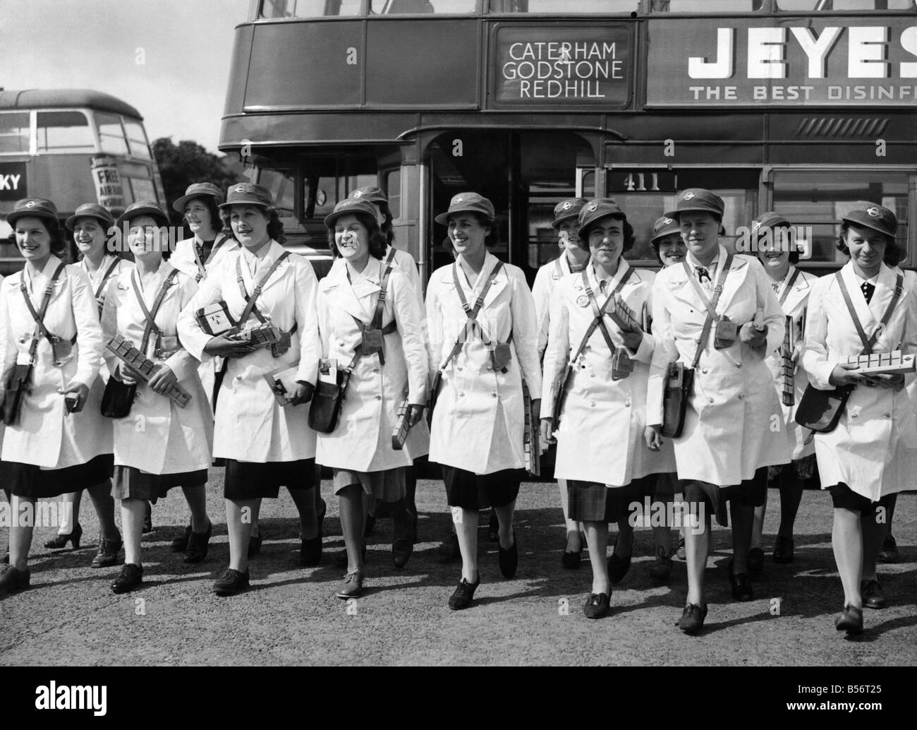 Women conductresses ready for work. a fine lot of girls off for the start of their new careers.;July 1940 ;P010118 Stock Photo