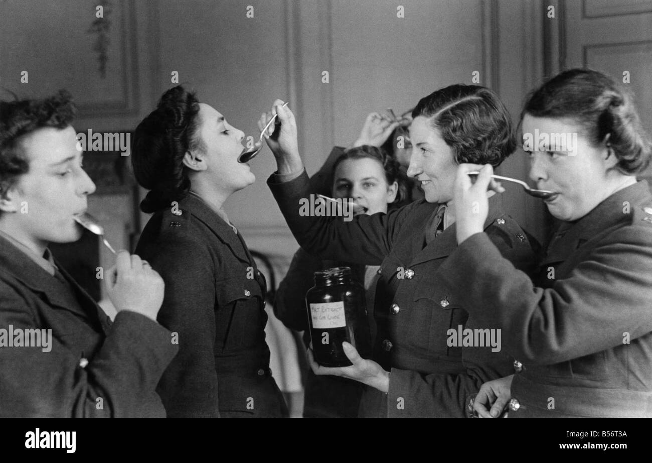 A spoonful of sugar makes the medicine go down. ;ATS girls seen here taking cod liver oil