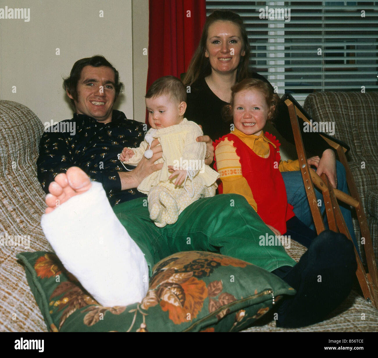 George Connelly at home with his wife and daughters March 1973 Stock Photo