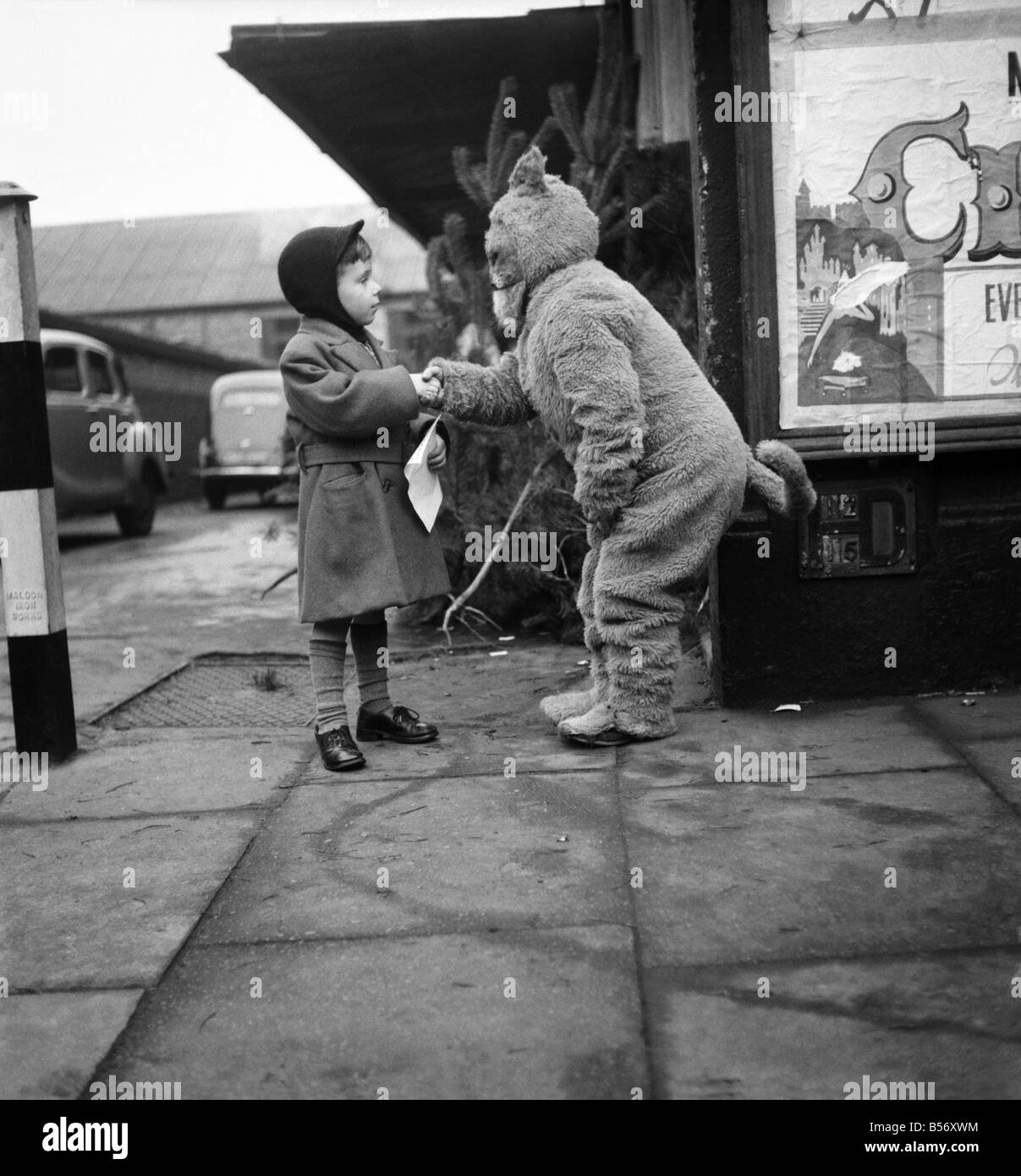The cat from Dick Whittington seen here shaking hands with a young ...