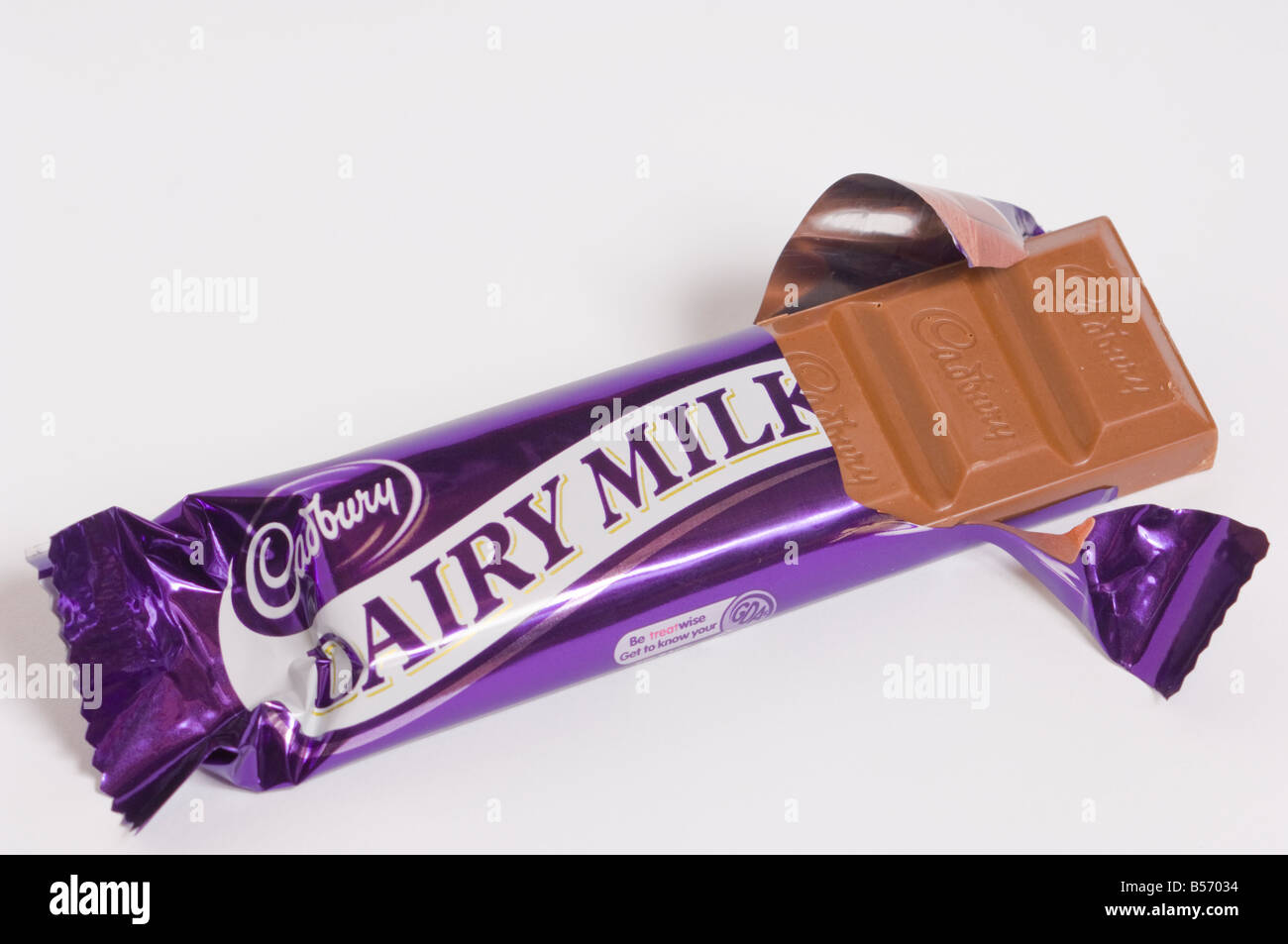Cadburys Dairy Milk Chocolate bar (opened) on white background Stock Photo