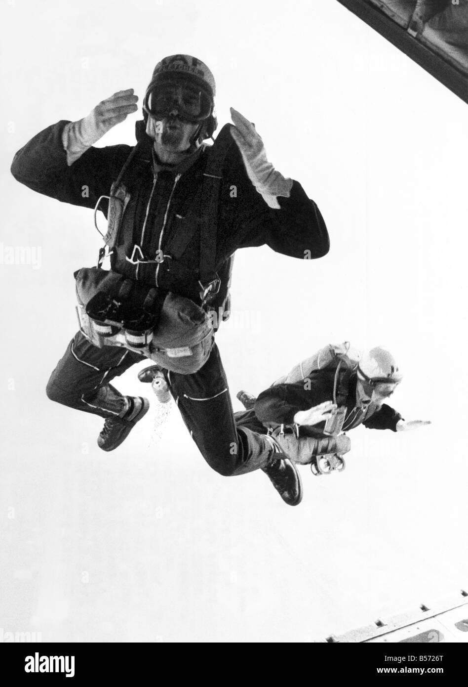 The Falcons swoop back into action, blowing a cheerful mid-air kiss. The Royal Air Force's famous skydivers were making their first drop since their nightmare air crash in Italy eleven days ago. Two members of the team were killed when their Andover transport plane crashed near Sienna. ;April 1972 ;P004312 Stock Photo