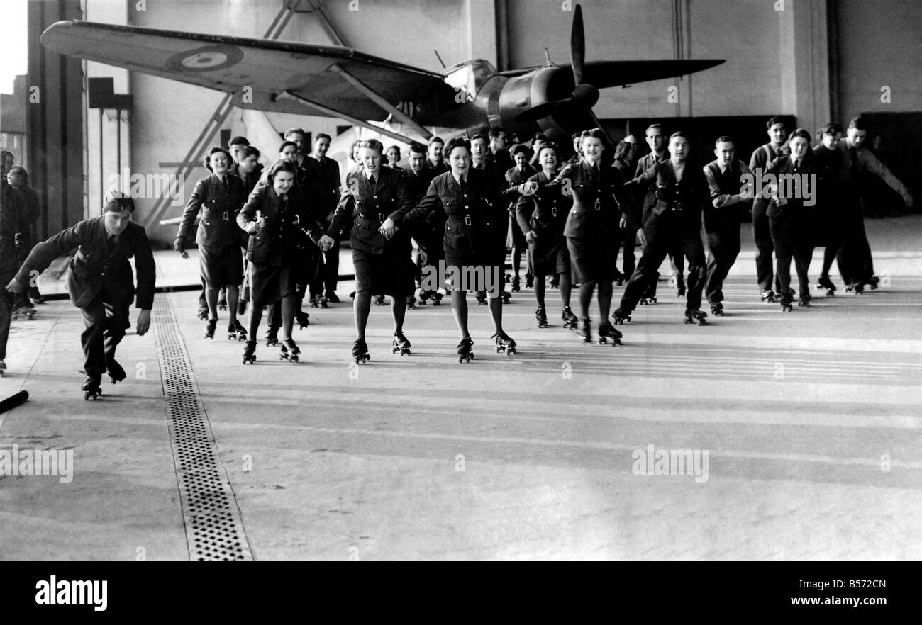 World War II Women. WAAF and RAF ground crew seen here roller skating