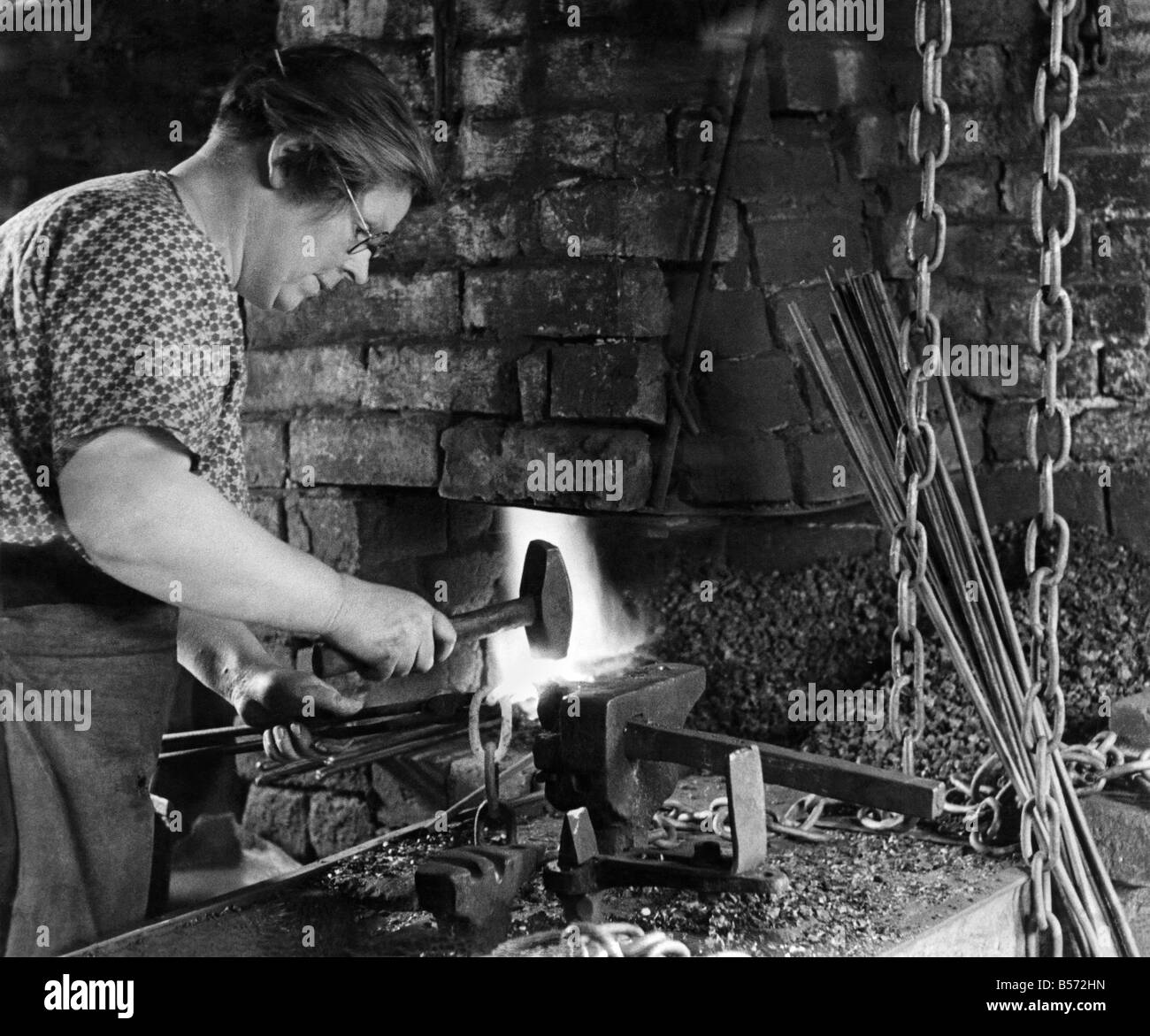 World War II Women. The blacksmiths mother takes over the whilst