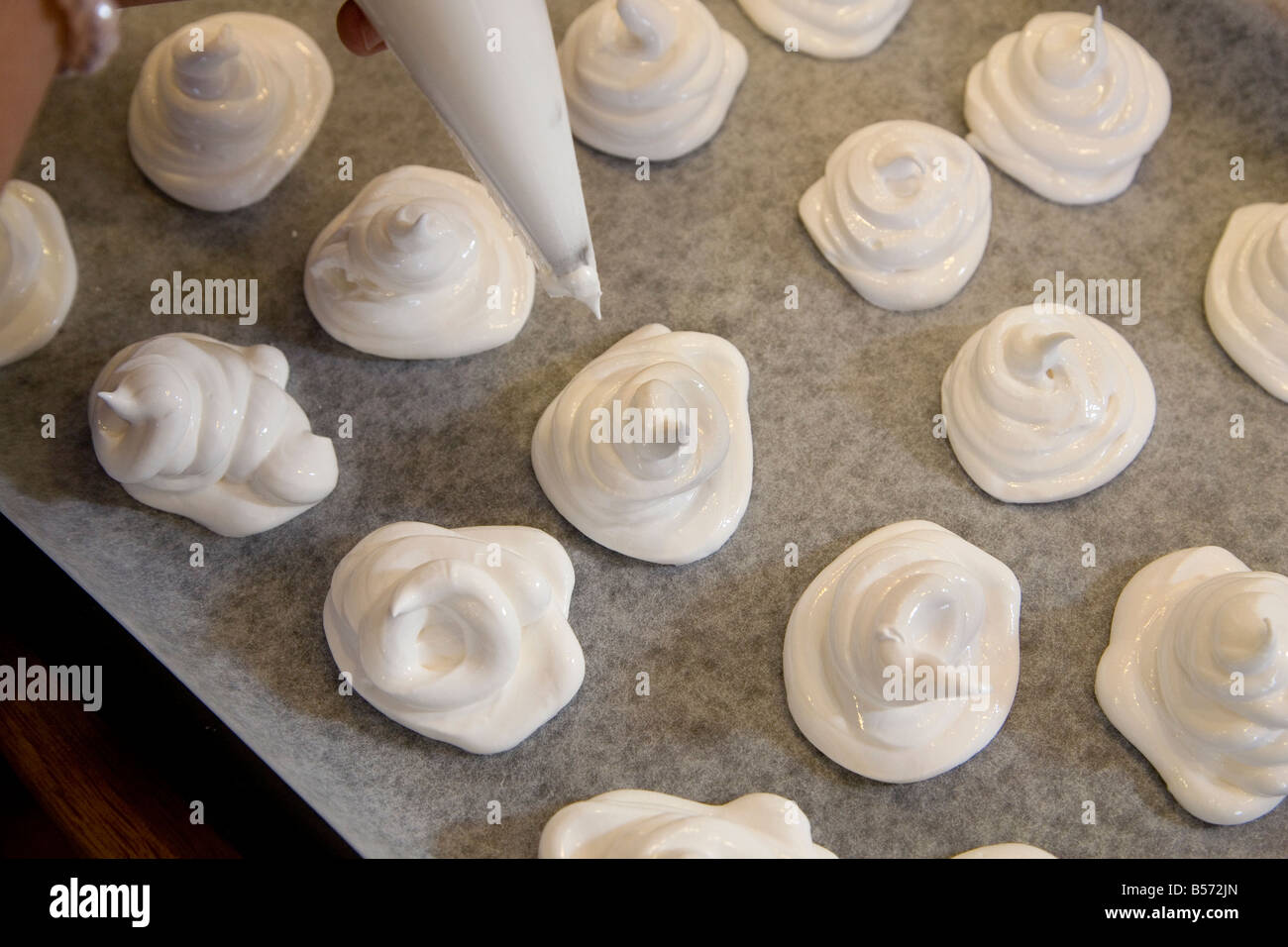 Meringues on a baking tray Stock Photo
