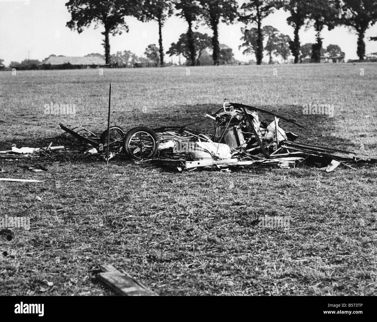 Three Killed in London Air Collision. Charred remains of the aeroplane of Captain G.F. Boyle, who was burned to death in it. His light earoplane collided with that of Flight-Lieutenant White's about 300 ft. above Valley Farm, Flight-Lieutenant had as a passenger Mr. F. Lincoln Knight who was also killed. P003923 Stock Photo