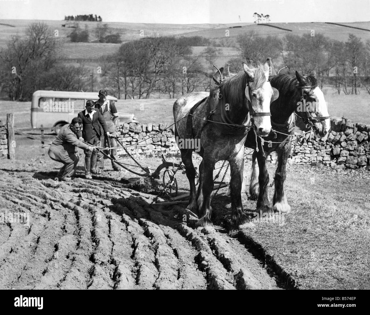Norman Fox, bus driver teaches boys farming at Faestone, Bellingham, Northumberland. April 1942 P004376 Stock Photo