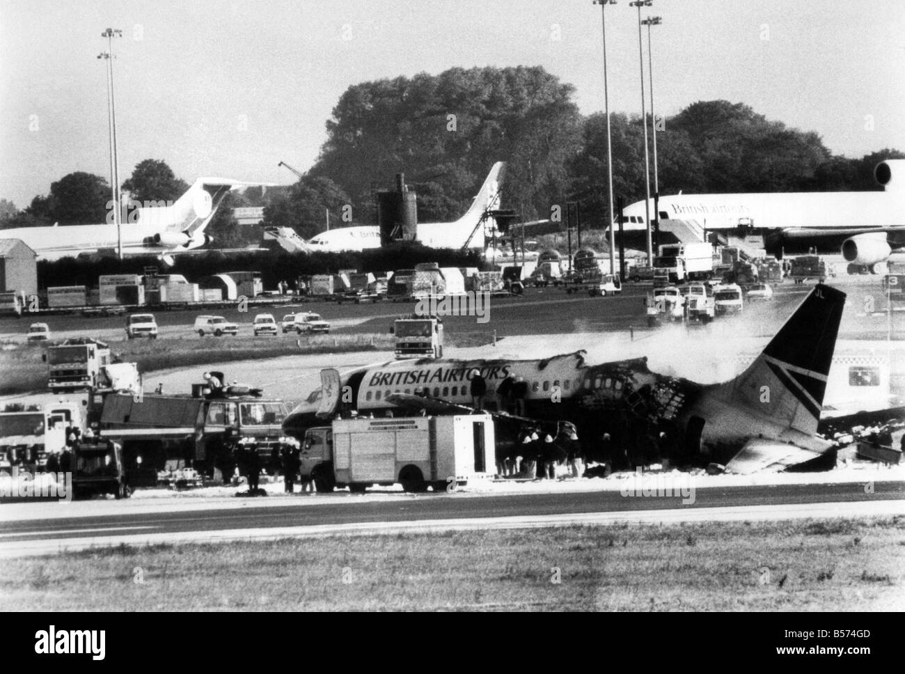 Manchester Holiday Flight Tragedy: Fifty-four passengers died early yesterday morning when an aircraft exploded at Manchester Airport. Eighty-three people escaped with various injuries, although only 79 were taken to hospital and 15 were detained suffering from burns. Two of the crew of six were among the dead, who have yet to be named. In all 137 passengers were aboard the Boeing 737 as it approached take-off at 100mph. August 1985 P004418 Stock Photo