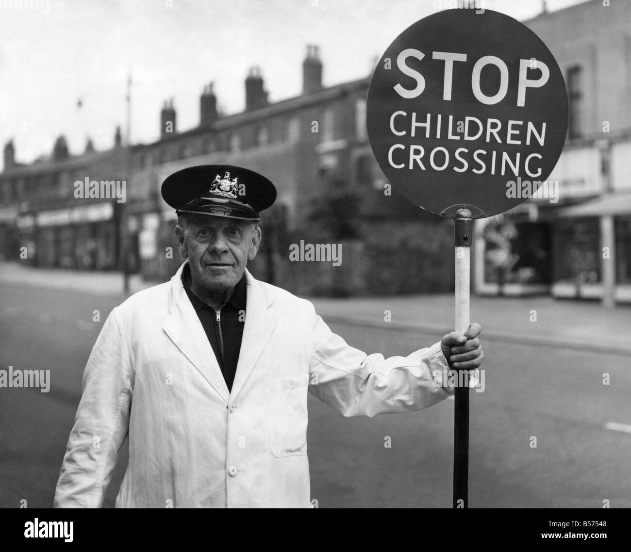 Mr. Harry Markley -69 of Orient Street, Cheetham Hill, Manchester, who is a traffic warden on Bury Old Road. September 1956 Stock Photo