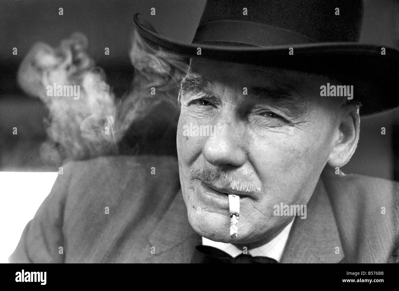 That mean Cowboy look. Lot Beedon 63 years old miner goes looking for the sheriff of Wombwell, smoking a cigarette. Nov. 1969 Z1 Stock Photo