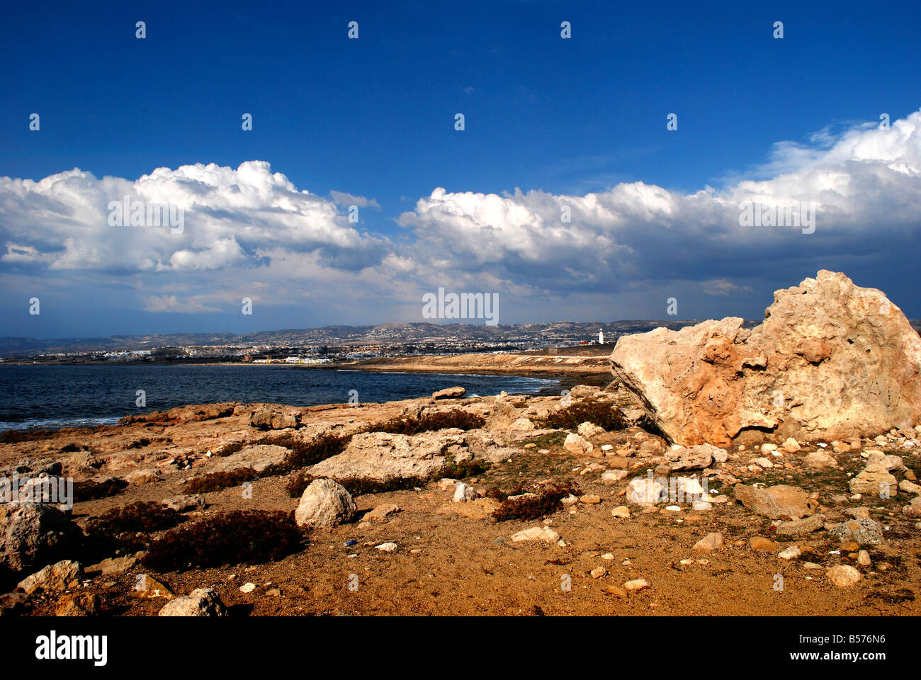 The beach and seashore seen from the lighthouse walk with the lighthouse in the distance at