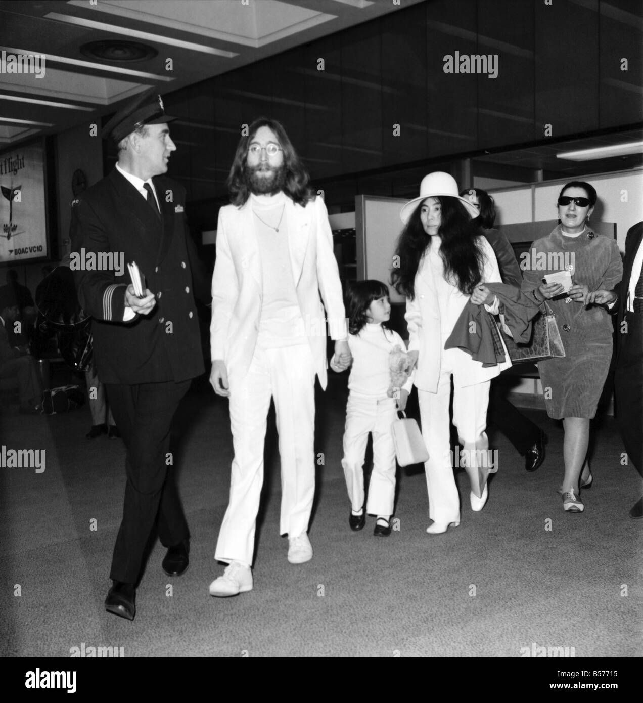 Beatle John Lennon and his wife Yoko Ono left Heathrow Airport London this afternoon (Sat) to fly to the Bahomes for another Bed Stock Photo