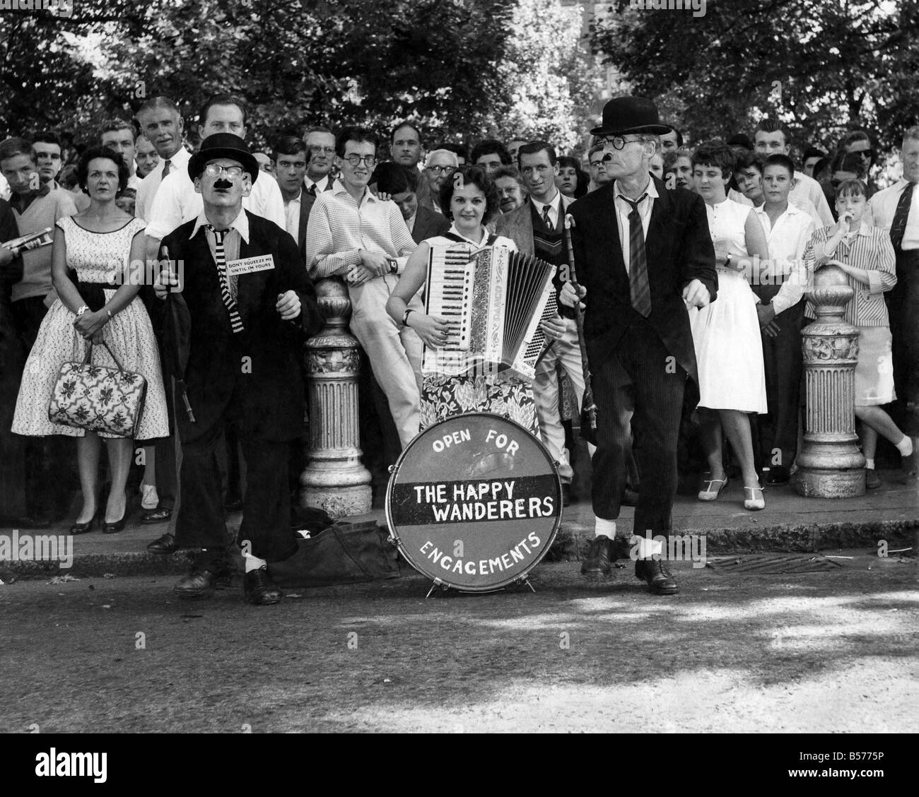 Performing in Leicester  Square (Left to Right) is Ronnie Ross, Mickie Glover, and Albert Hollis. August 1959 P004920 Stock Photo