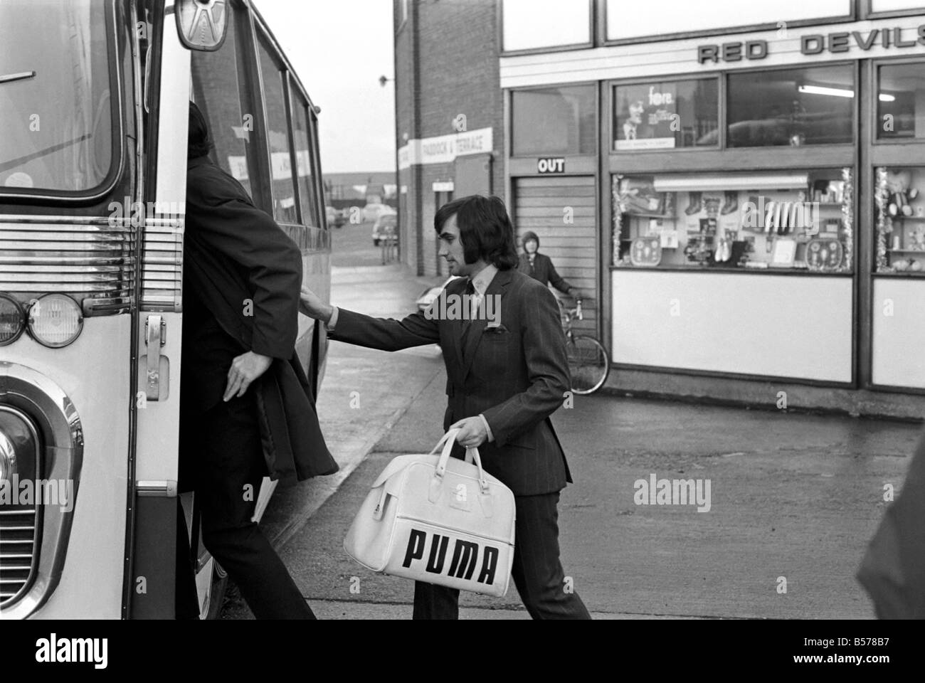 George Best right as he left Old Trafford ground to board the coach on route to Ipswich he had just been suspended and fined. January 1970 70-00102 Stock Photo