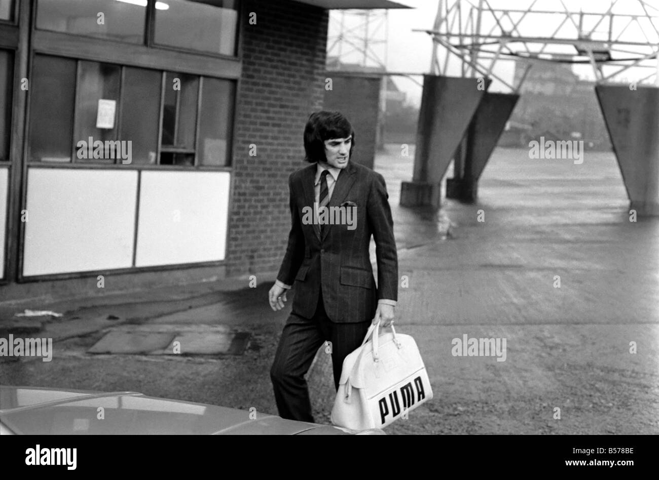 George Best right as he left Old Trafford ground to board the coach on route to Ipswich he had just been suspended and fined. January 1970 70-00102 Stock Photo