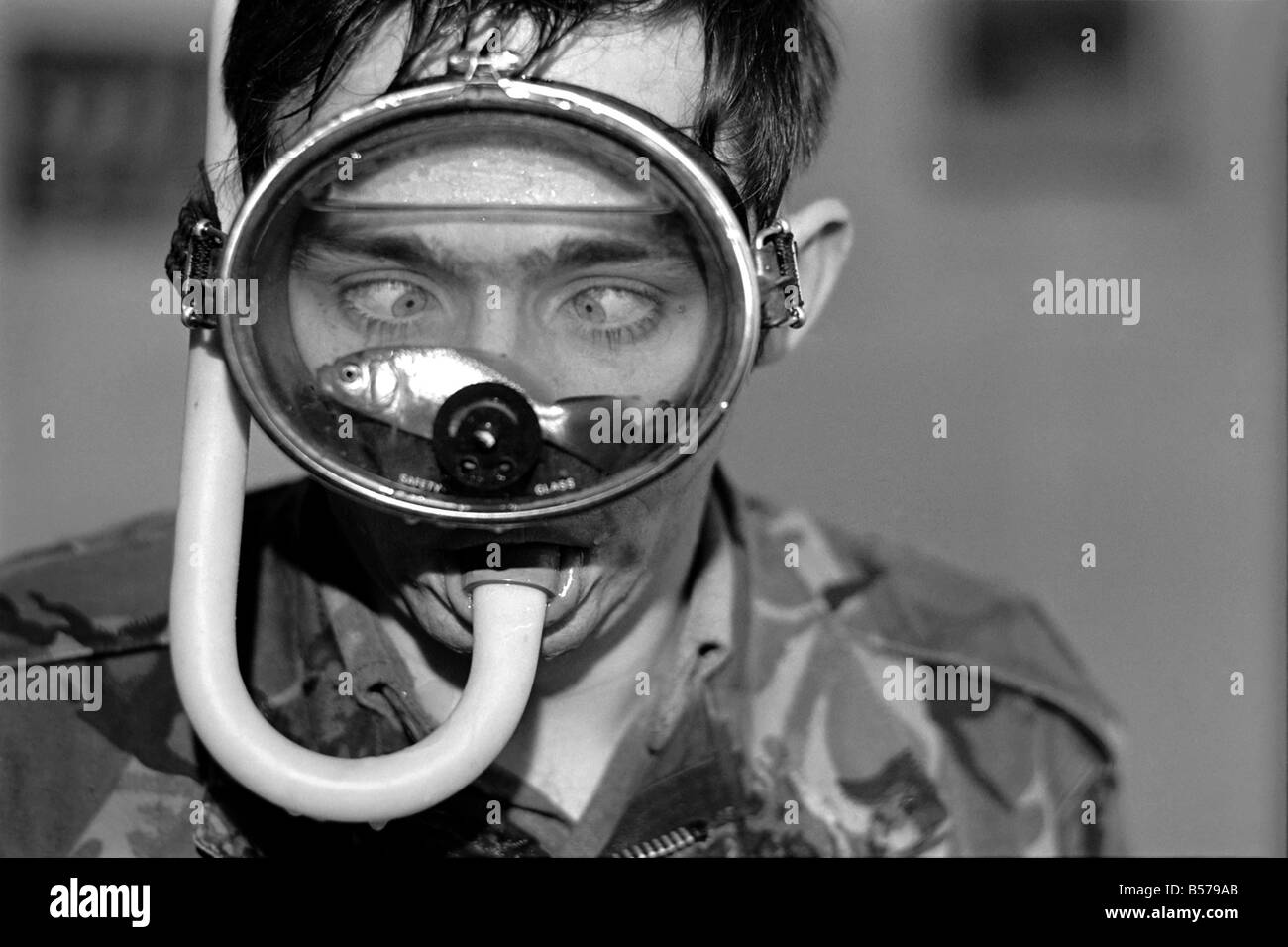 Martin Chapman. Goldfish in diving mask. January 1975 75-00642 Stock Photo