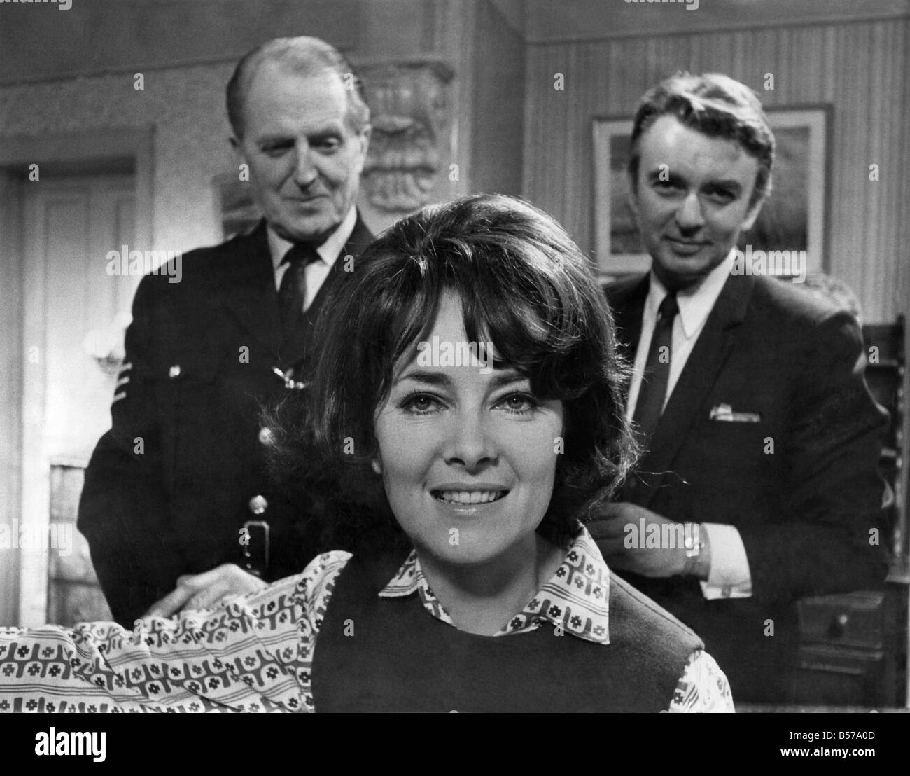 The famous Dixon of Dock Green Trio back on your screens soon. Jack Warner as Dixon, Jeanette Hutchinson as Mary, and Peter Byrne as Andy Crawford. August 1969 P005292 Stock Photo