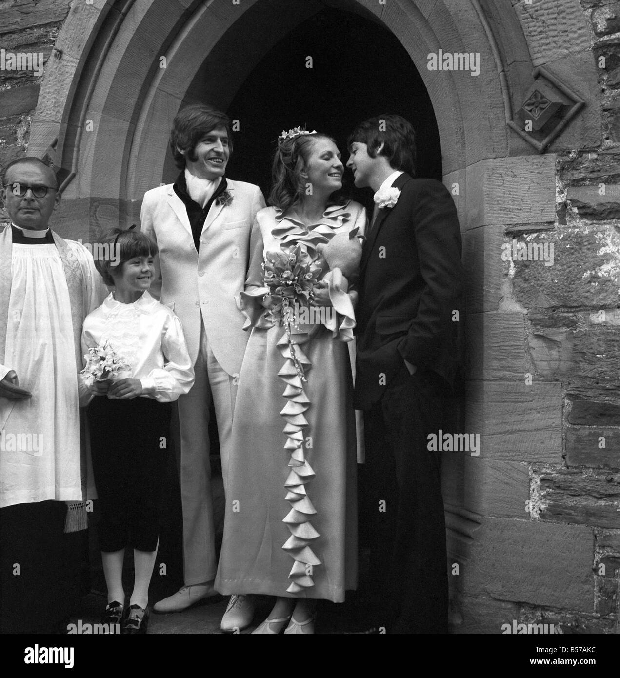 Mike McCartney's Wedding. A kiss for the bride from Paul McCartney ...