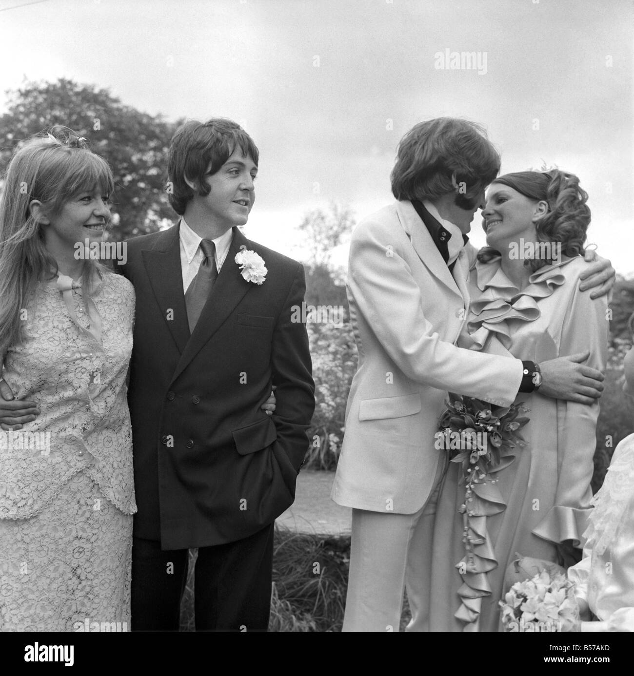 Mike McCartney's Wedding. ;Mike McGear kisses bride Angela watched by ...