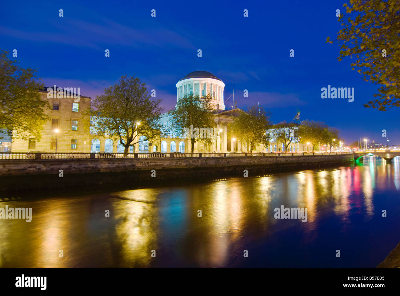 The Four Courts and the River Liffey in Dublin City by Night Stock Photo