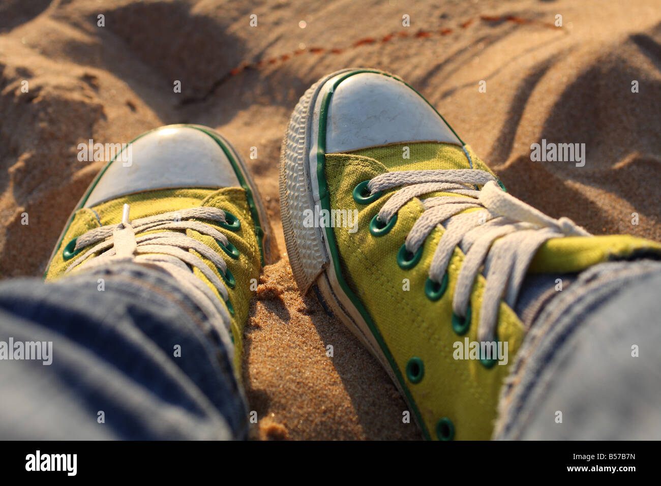 Converse shoe on yellow hi res stock photography and images Alamy