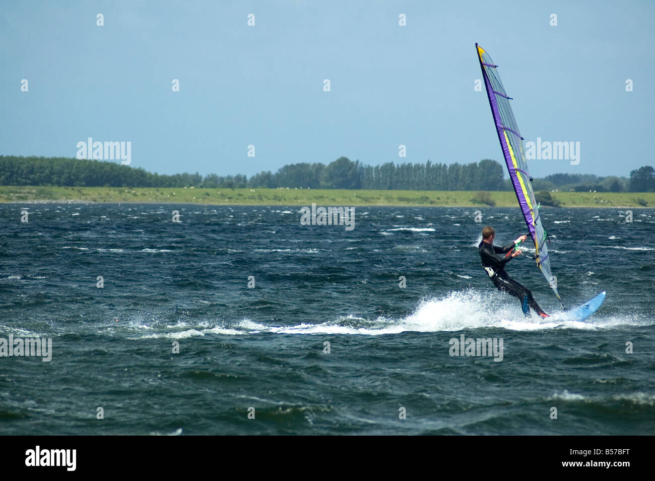 Windsurfing in the Dutch waters Moving fast windspeed 10 Stock Photo
