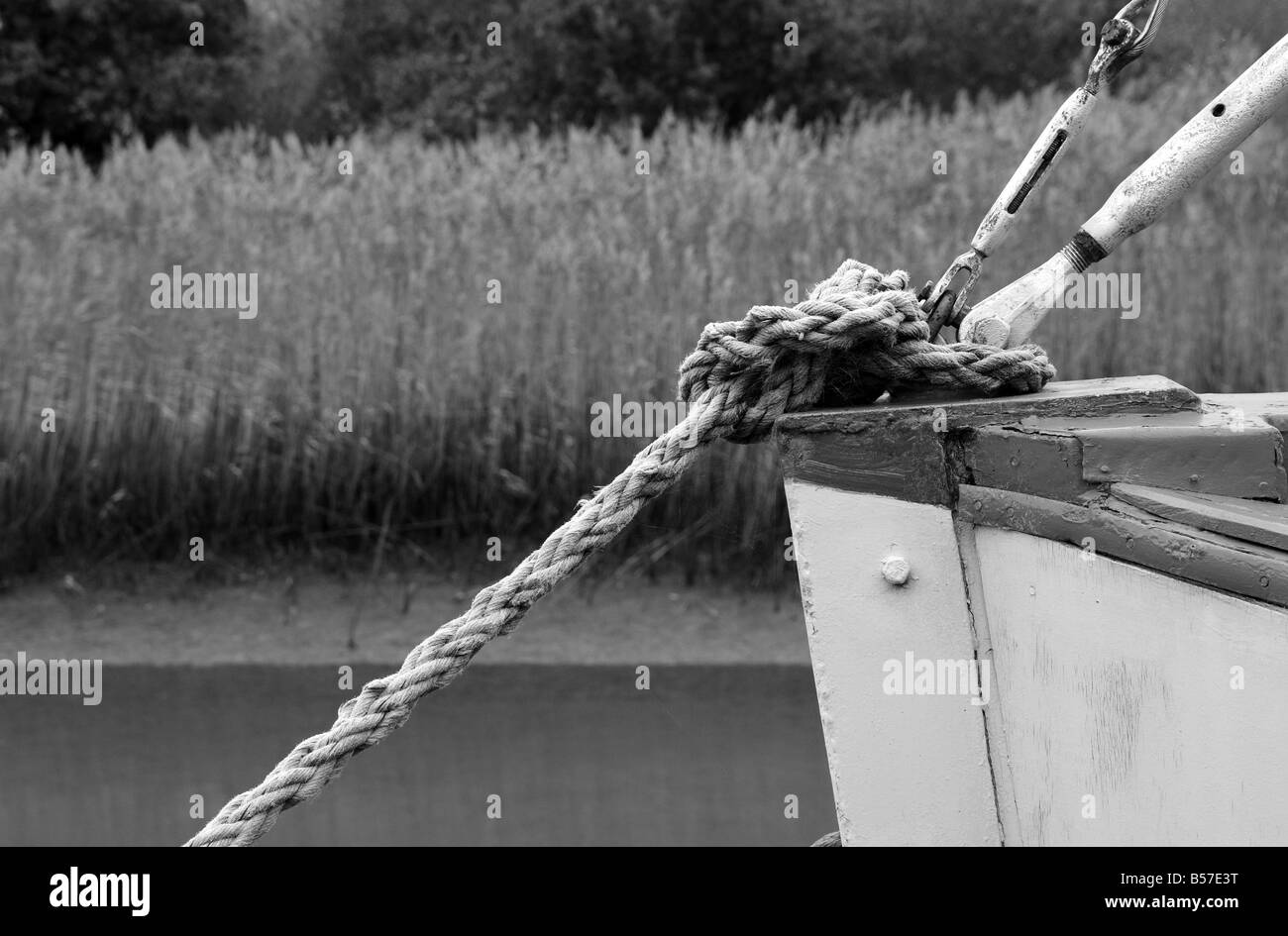 A boat moored near the Maltings concert hall at Snape in Suffolk in England Stock Photo