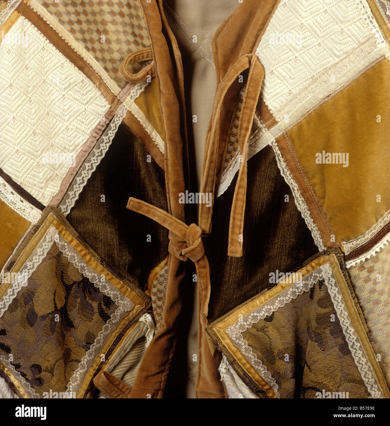 Crafts detail of patchwork tapestry jacket fastening Stock Photo