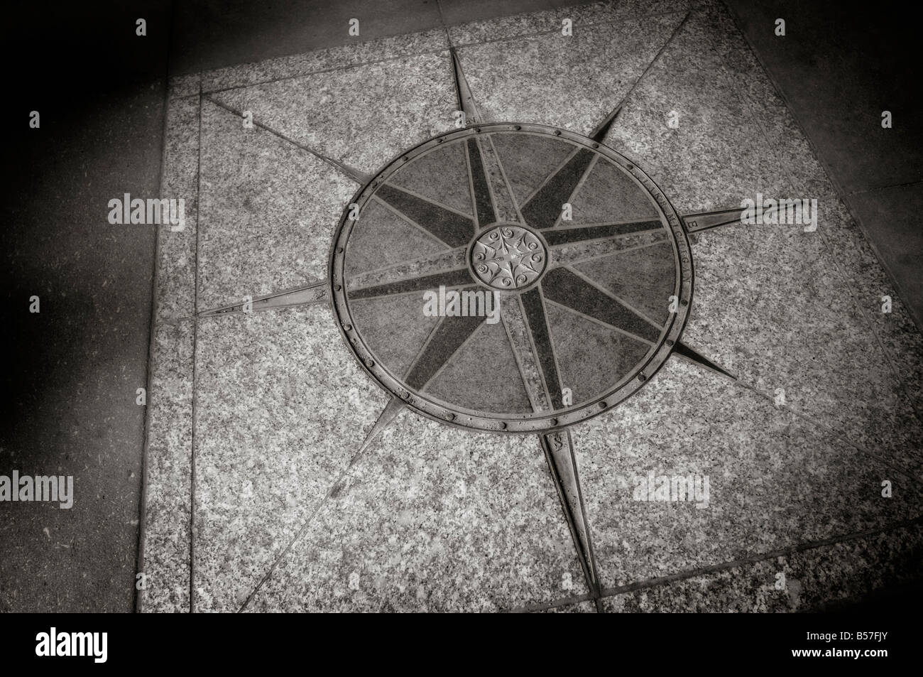 Compass Rose, by granite and steel, on the pavement of The Loop