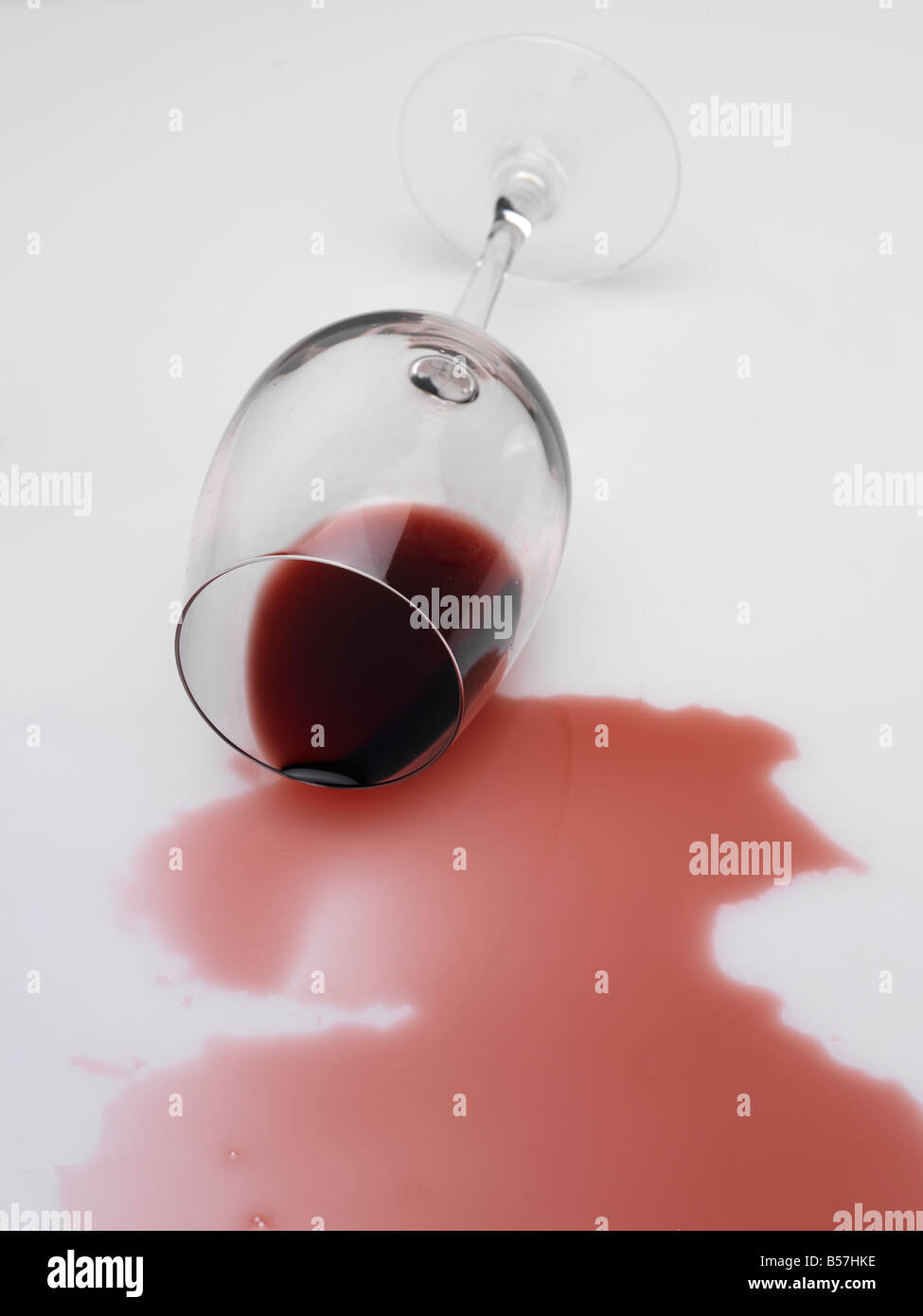 Spilt glass of red wine Stock Photo